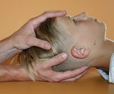Craniosacrale Grifftechnik am Kopf